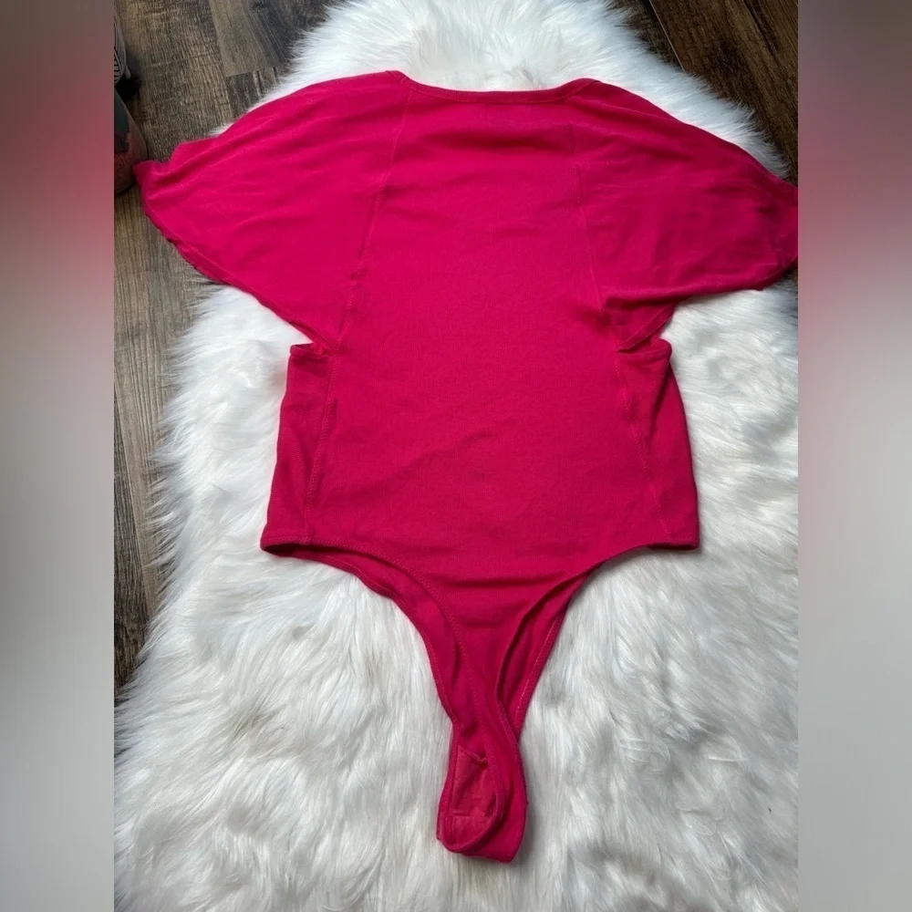 FREE PEOPLE
Byron Ribbed Flutter-Sleeve Bodysuit - Picture 4 of 6